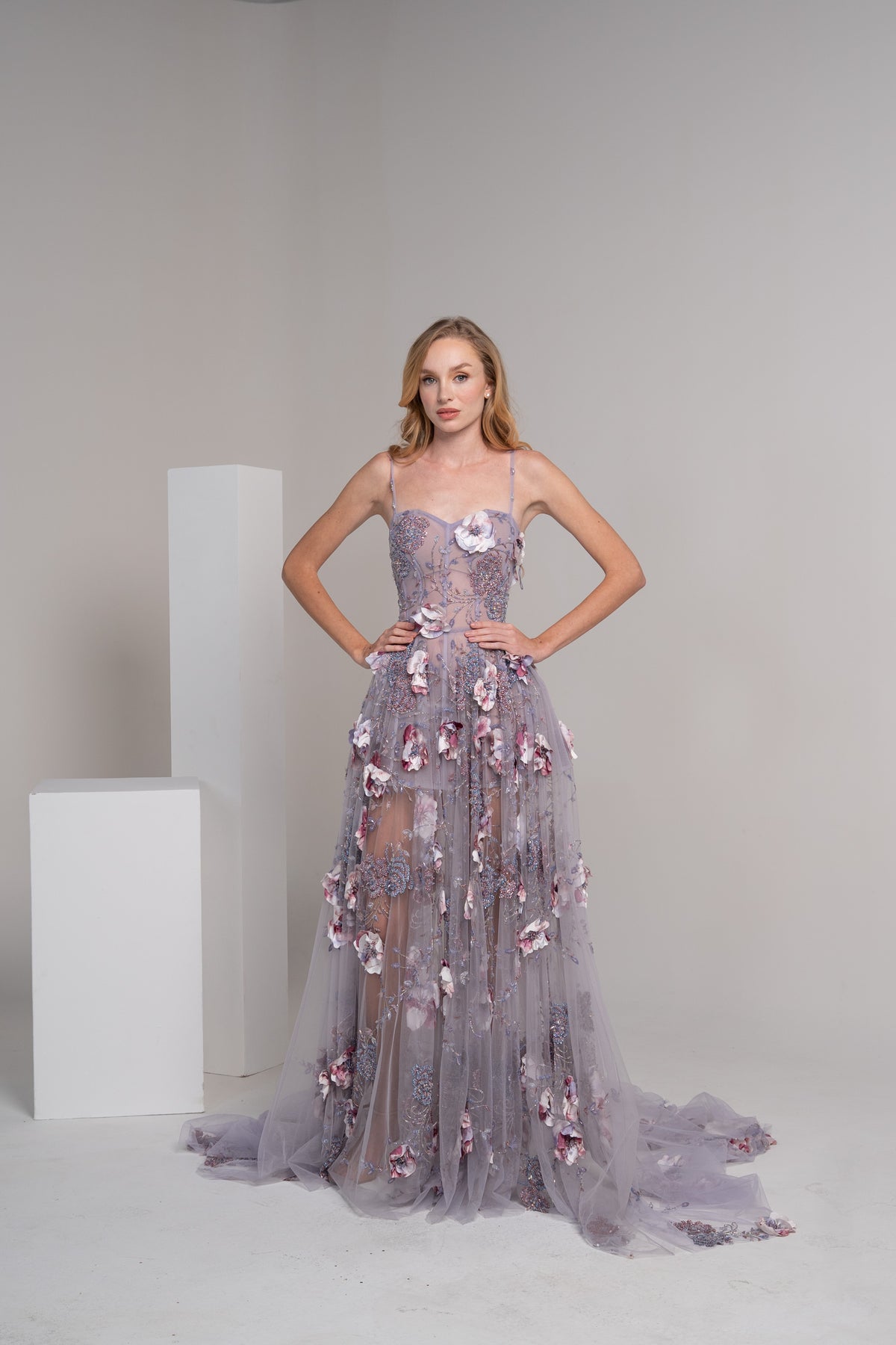Purple corset down dress with 3Dfloral details.
