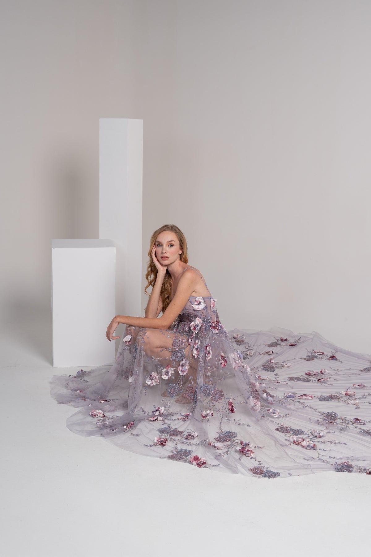 Purple corset down dress with 3Dfloral details.