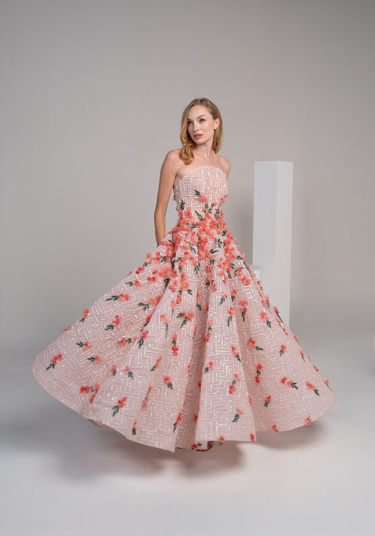 structured pink puffy dress adorned with delicate 3D flowers