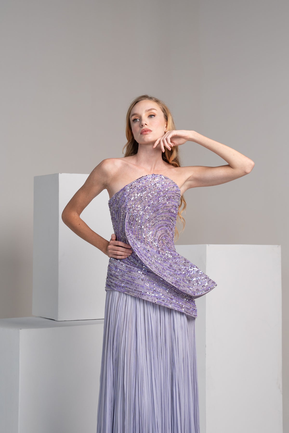 Purple beaded bodice with a pleated chiffon skirt.